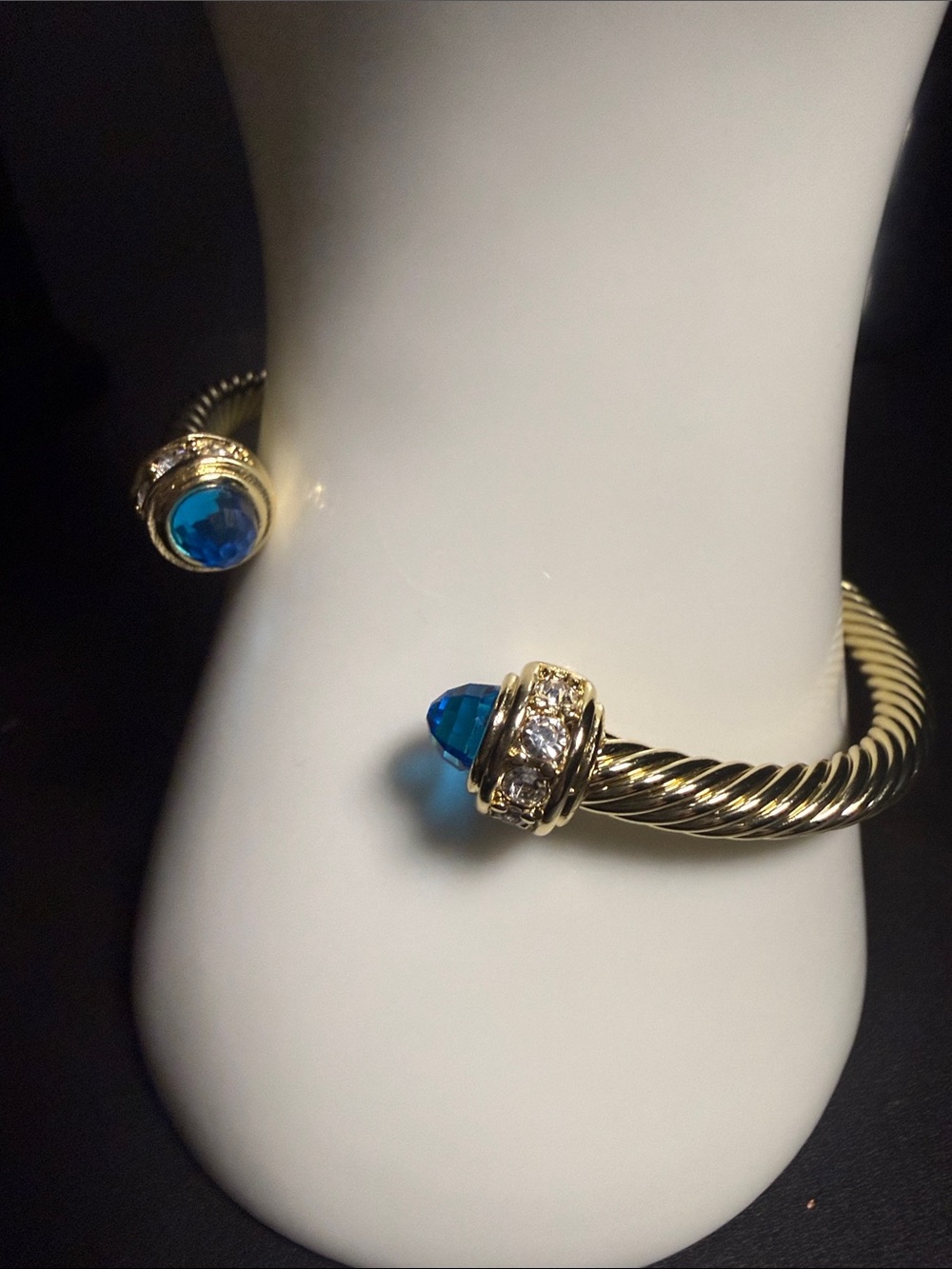 Gold-Tone Twist Cuff Bracelet with Blue Crystal Finials